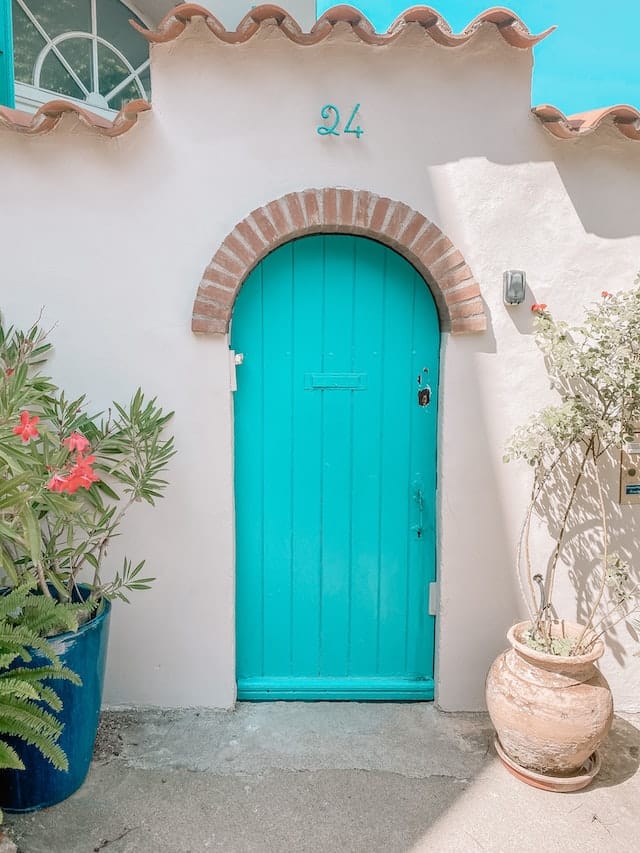 arched aqua blue door