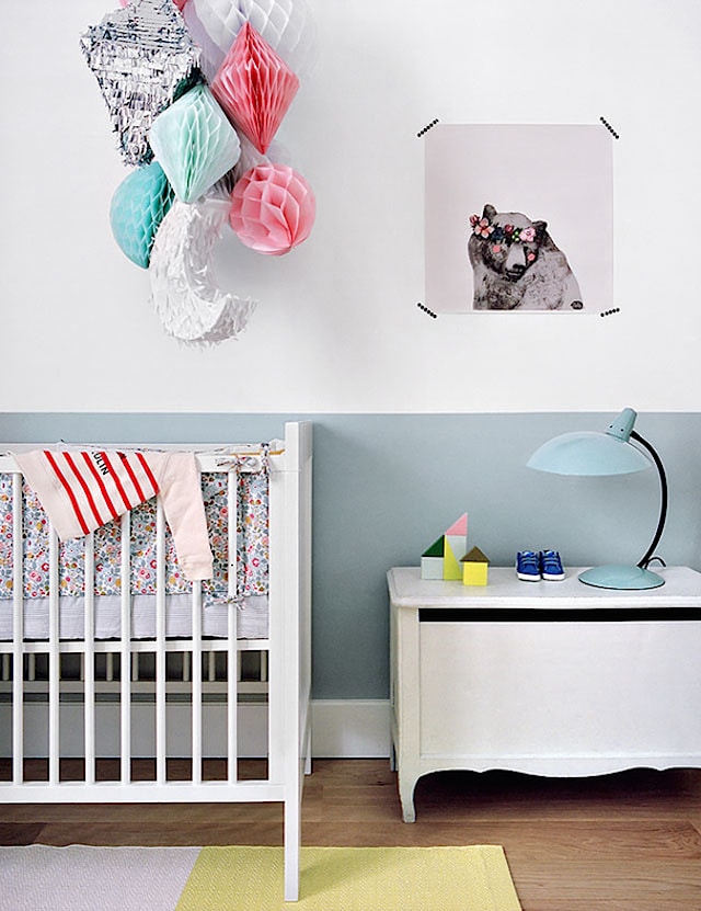 Baby room with an accent color and pastel colors.