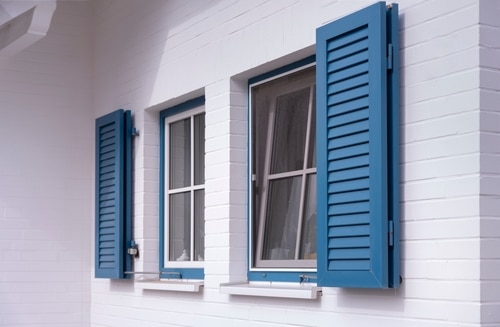 A pop of fresh blue house window.