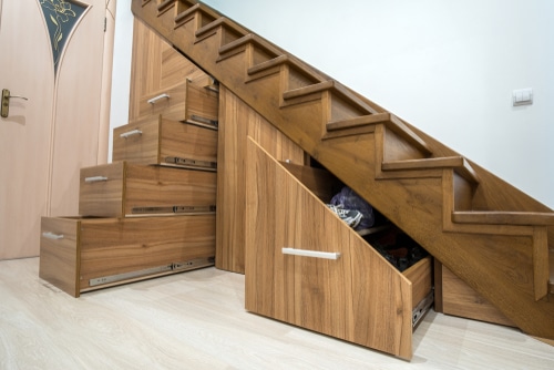 built in drawers stair A classic wooden staircase with incorporated pull out drawers.