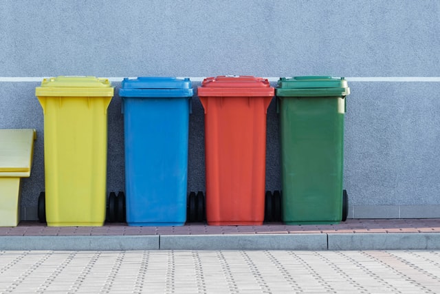 A color coded trash bin types.