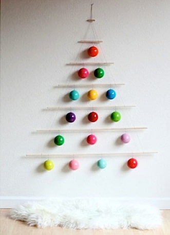 A wall style christmas tree using colorful christmas balls
