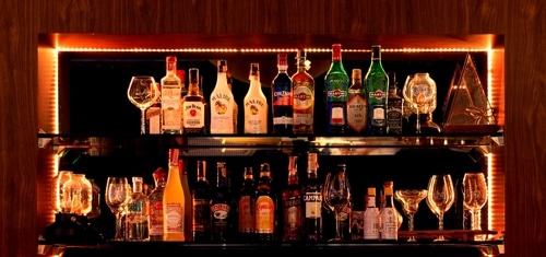 floating bar Floating bar shelf full of liquor