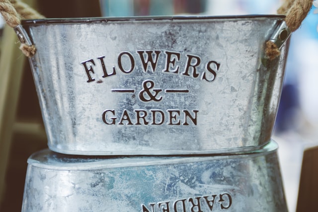 Flowers and Gardens engraved in a tin bucket