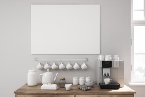gray kitchen area with light colored mugs