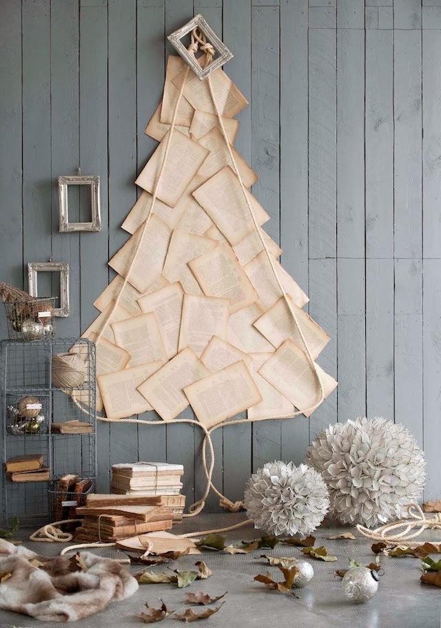 Old book pages used to make a collage of a christmas tree