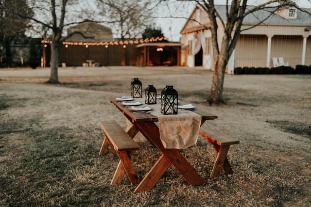 outside dining with lantern decor on the table