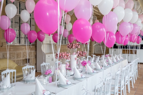 pink themed baby birthday party full of pink balloons