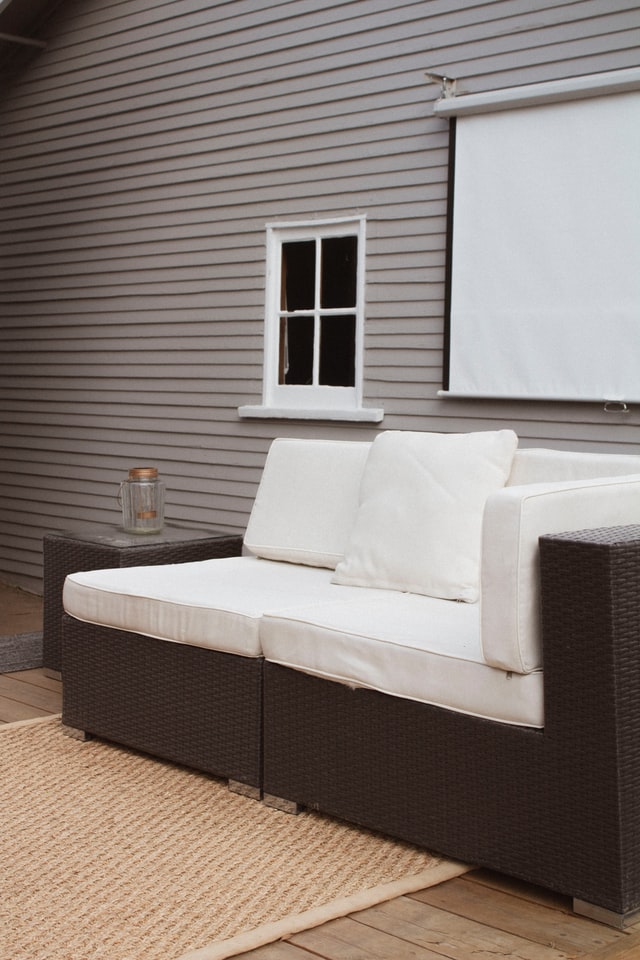 plastic outdoor sofa Brown and white outdoor plastic sofa