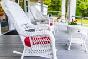 white rocking chairs on the front porch