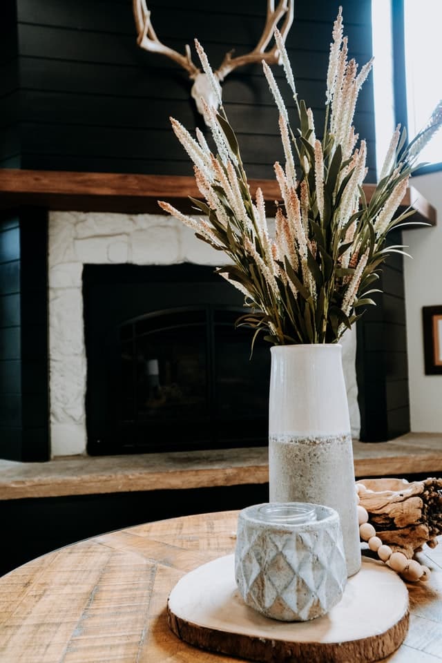 dried flower in a simple vase as table centerpiece