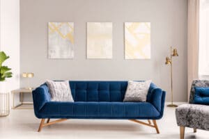 Velvet blue couch in living room