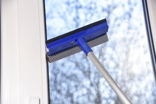 A window squeegee for wiping glass windows