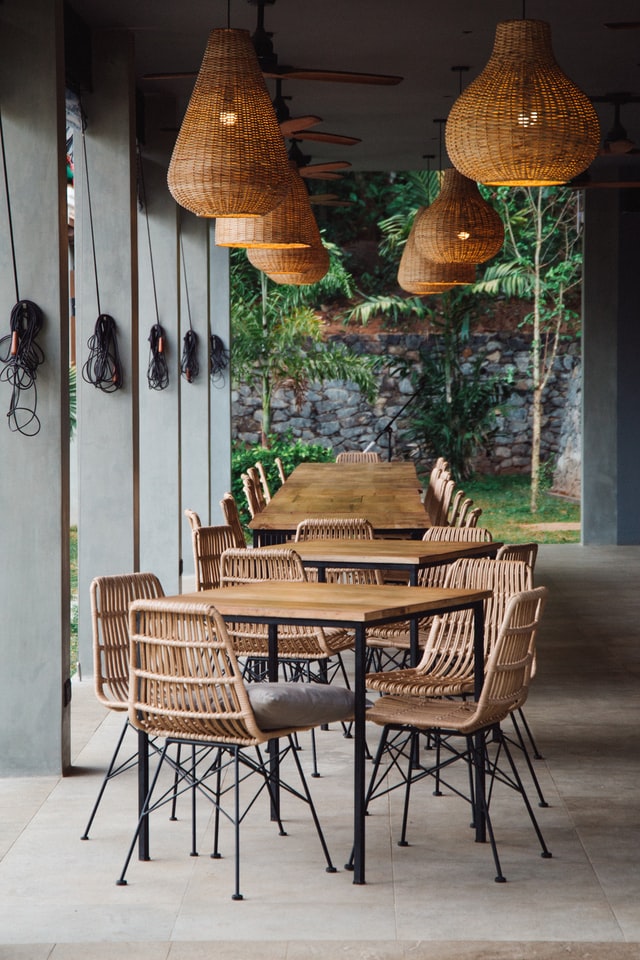 Woven rattan overhead lamps and chairs