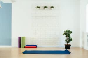 Yoga room with blue mat